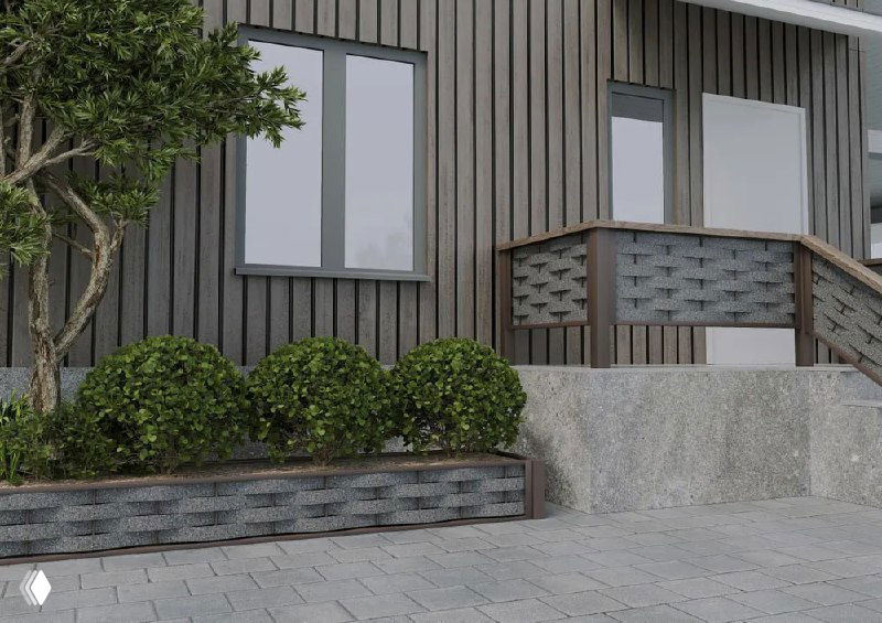 Фрагмент фасада и низкой декоративной кладки у дома с применением полимерной коры; пример использования материала в отделке и ландшафте загородного участка.