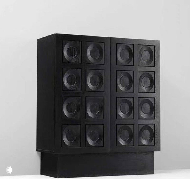 Фотография комода из ясеня тёмного оттенка с рельефным геометрическим фасадом на нейтральном фоне — вид товара в каталоге.