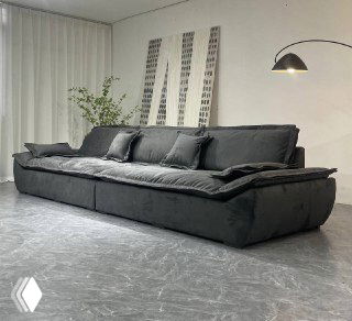 Темный тканевый диван Галеон на мраморном полу, вид в интерьере с настенным декором и торшером, современный минимализм в гостиной.