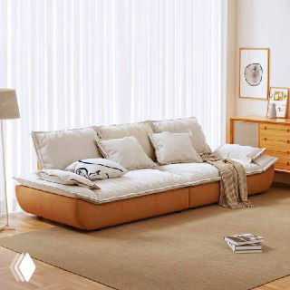 Светло-бежевый диван Галеон с подушками и текстильным пледом, общий вид на модель в интерьерной постановке с журнальным столом.