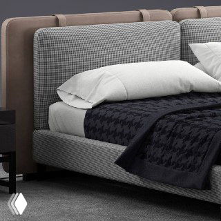 Крупный план изголовья и постельного белья: текстура ткани, вставки из искусственной кожи и аккуратная строчка в деталях.