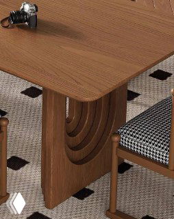 Крупный план декоративной боковой опоры стола из ясеня с U‑образным узором, видно качество обработки краёв и декоративных элементов.