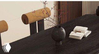 Крупный план столешницы из тёмного массива ясеня: текстура древесины, декоративная ваза и открытая книга на поверхности столешницы.