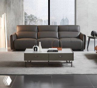 Серый кожаный диван Cowhide в интерьере: трёхместный модуль с мягкой спинкой и оформлением в современном зале.