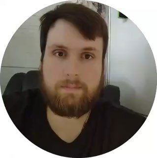 Круглая фотография автора — портрет мужчины с бородой на фоне комнаты; нейтральная аватарка для канала по подготовке к ОГЭ.