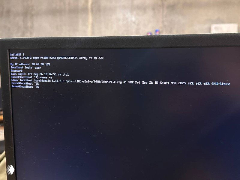 Фотография экрана с выводом загрузки: строки консоли ядра Linux 5.14 и сообщения, указывающие на запуск системы с поддержкой процессора Эльбрус на реальном железе.
