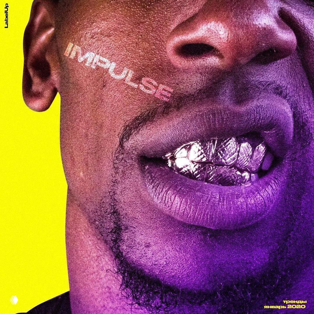 Оформление обложки журнала IMpulse: крупный план нижней части лица с металлическими золотыми накладными зубами и надписью IMPULSE на щеке, яркие пурпурно‑жёлтые тона