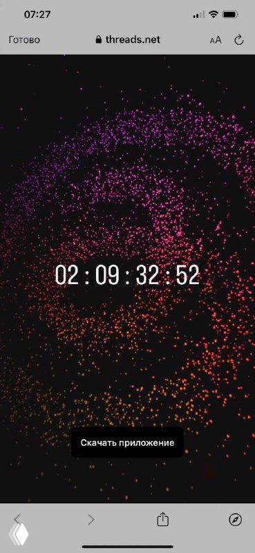 Скриншот страницы Threads с крупным цифровым обратным отсчётом (часы и секунды) на фоне цветного абстрактного узора, вид на мобильном экране.