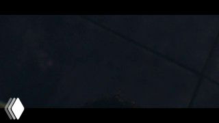 Чёрный фон кадра из ролика кампании ChatGPT: тёмная сцена с минималистичными элементами, лого бренда и кинематографическая подача