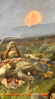 Фотография эпического фрагмента картины Васнецова: лежащий воин на фоне заката и степного пейзажа, снято в музее Петербурга. Снимок из серии автора с выставки.