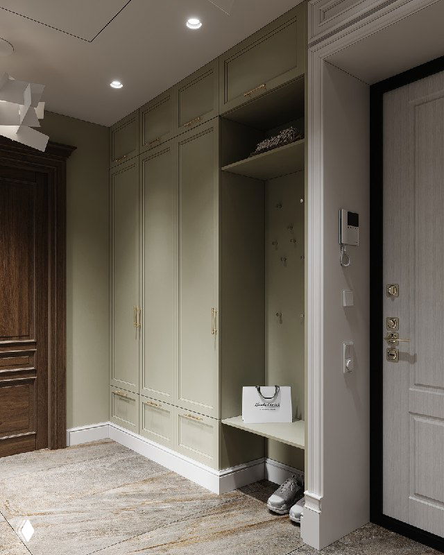 Глубокий встроенный шкаф в прихожей с секциями для пальто, нишей с сиденьем и местом для хранения обуви и сумок.