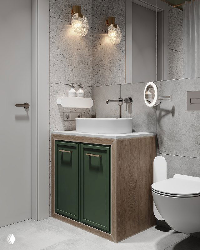 Компактная ванная: раковина на столешнице, зелёная напольная тумба с нишей, зеркальные фасады, настенные бра и серая керамогранитная плитка в интерьере.
