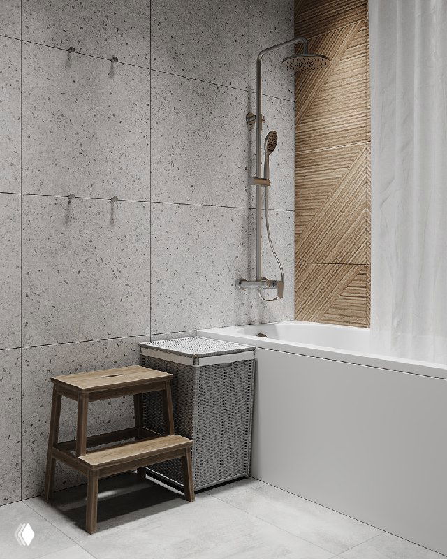 Угловая композиция ванны и душевой: белая ванна, деревянная плитка-акцент за стеной, небольшая деревянная ступенька и корзина для белья у бортика.
