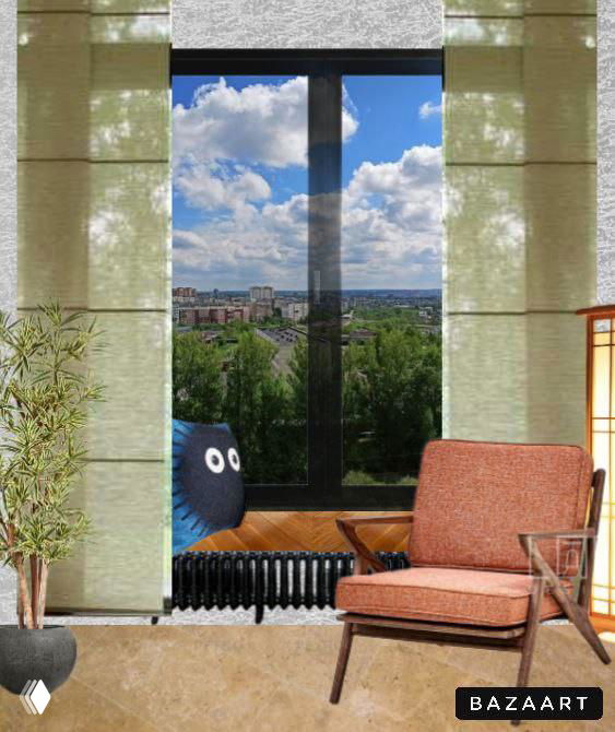 Зона у окна с креслом и видом на город; мягкие текстуры и зелёные шторы создают спокойный, натуральный акцент интерьера.