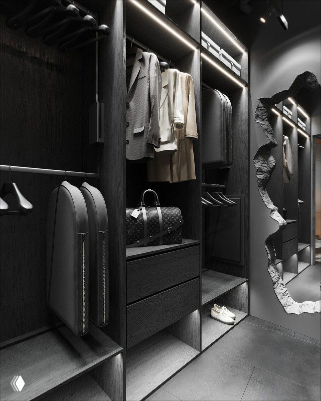 Интерьер гардеробной с чёрными полками, развешенной одеждой и точечной подсветкой, подчёркивающей текстуру отделки.
