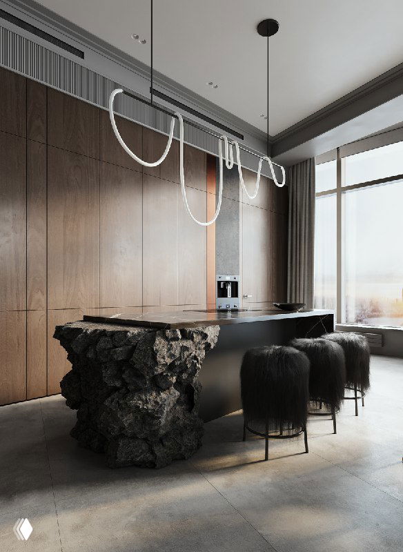 Угол кухни с графитовой панелью встроенной техники, медными вставками на фасадах и длинными барными стульями с мягким мехом у острова.