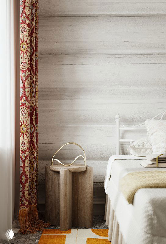 Деталь интерьера: портьеры с орнаментом, мягкая палитра текстиля и низкая деревянная прикроватная тумба на фоне светлой фактуры стен.
