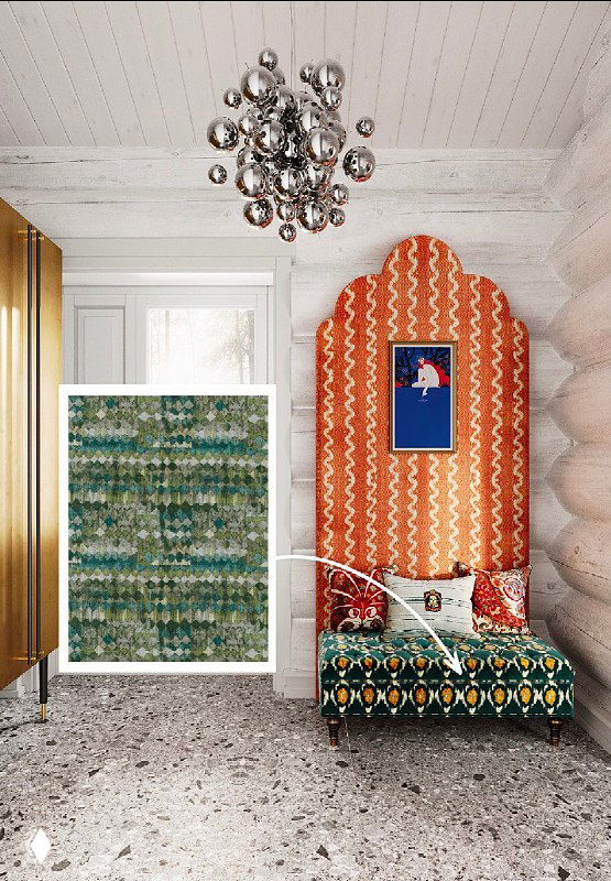 Композиция с креслом и яркой текстильной панелью, рядом образец ткани и современная хромированная люстра в интерьере бревенчатого дома.