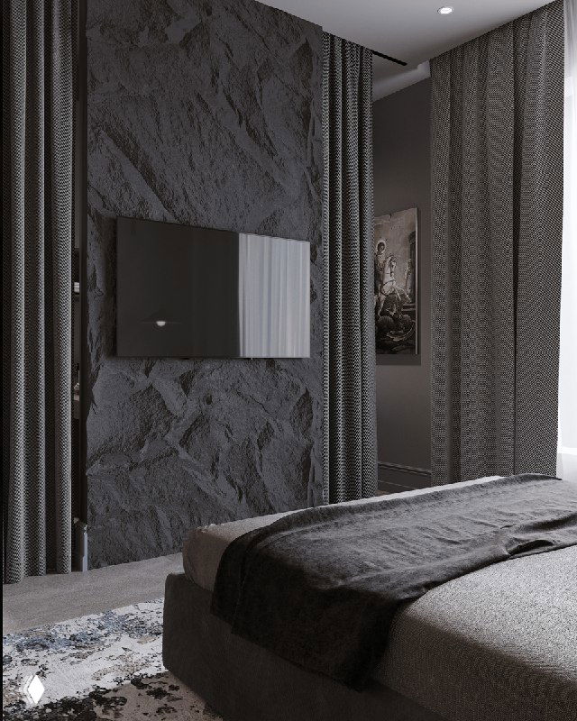 Угловой вид на спальню с текстурированной стеной и скрытым телевизором, показан переход материалов и игра света в пространстве.