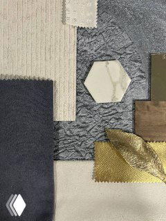 Детальный снимок образцов отделки и текстиля: сочетание нейтральных и золотистых оттенков, металлические и текстильные акценты проекта.