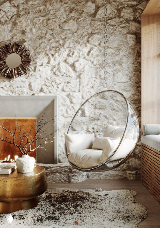 Гостиная зона с текстурной известняковой кладкой, утопленным паровым камином, подвесным прозрачным креслом и тёплой палитрой материалов, мягкими подушками на подоконнике.