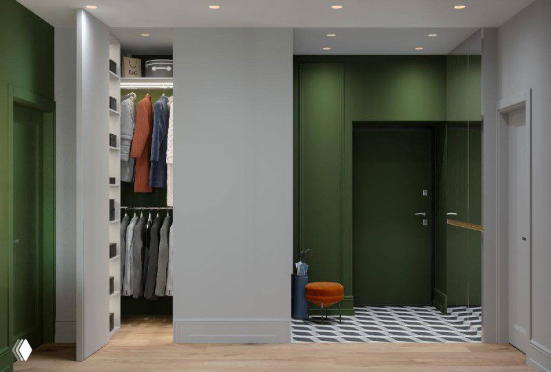 Прихожая с открытой нишей‑гардеробом: видны вешалки, полки с одеждой, зелёная дверь и контрастная плитка у входа.