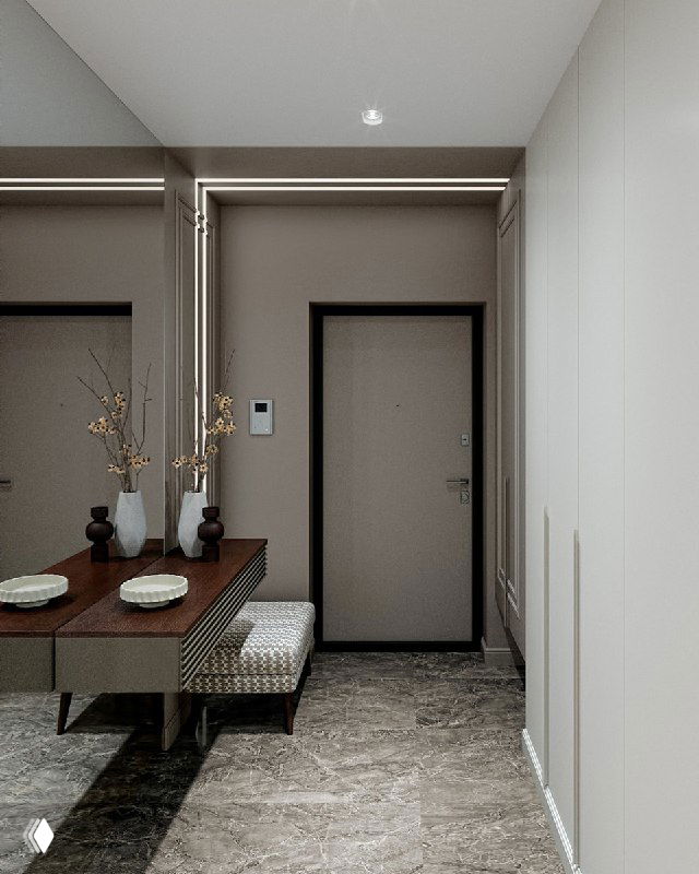 Вид прихожей со входной дверью, длинным встроенным шкафом и консолью: акцент на зеркале, пуфе и стеновой LED-полосе, визуально расширяющей пространство.