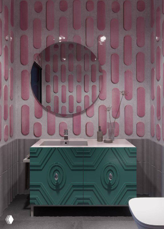 Яркая умывальная зона с зелёной тумбой и круглым зеркалом на розовом декоративном фоне, интерьерный объект от GRADIZ с акцентом на форму и текстуру.