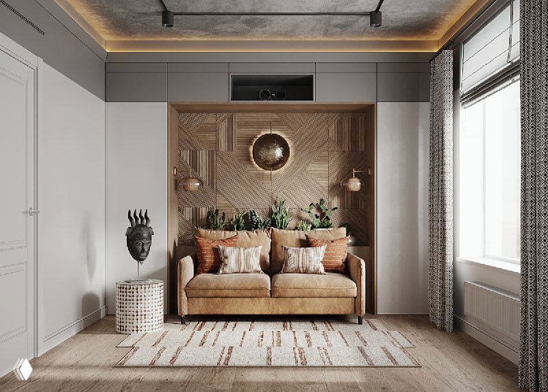 Интерьер библиотеки проекта «Джунгли Африки»: тёплый акцентный диван на фоне декоративных панелей из высушенных ветвей, светлые стены и ковер.