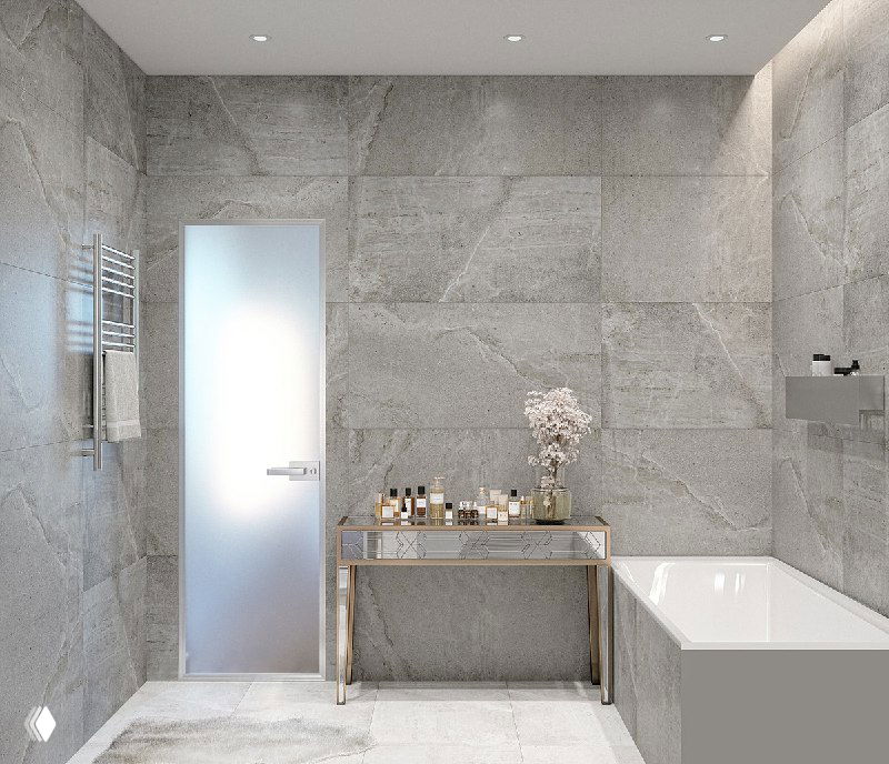 Ванная с серой крупноформатной плиткой, матовая стеклянная дверь, столик с аксессуарами у ванной — спокойная современная эстетика интерьера.