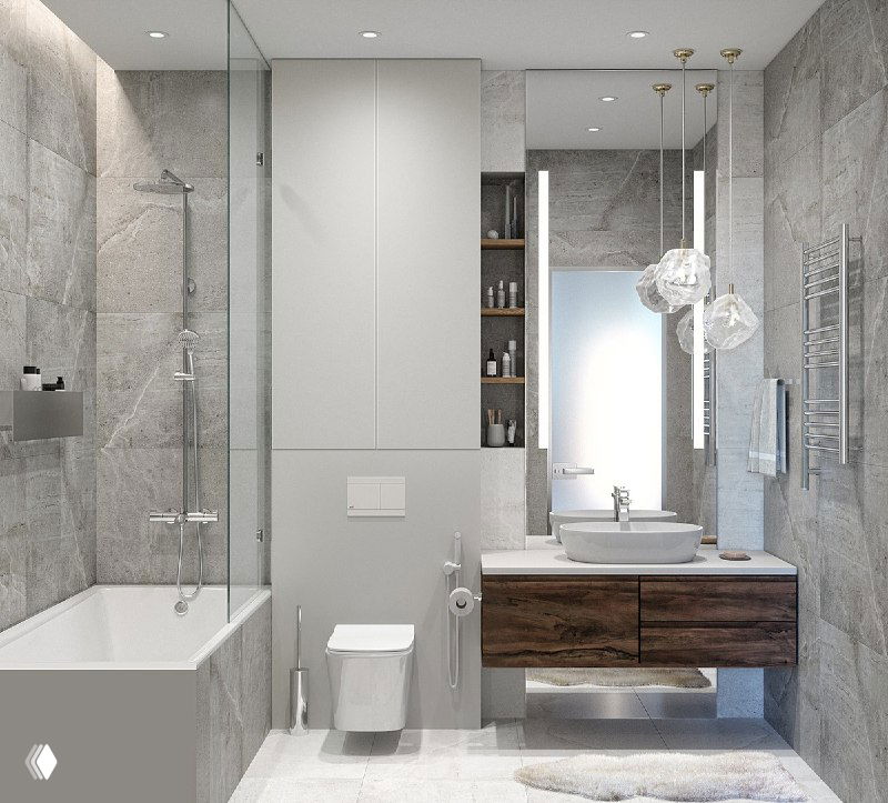 Широкий вид ванной: душ, унитаз, подвесная тумба и зеркало рядом со стеклянной дверью с рассеянным светом в сдержанной серой палитре.