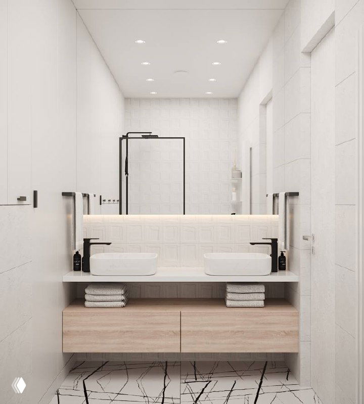 Светлая минималистичная умывальная зона с двураковинной столешницей и светлым древесным фасадом, большой настенный светильник и аккуратная организация хранения.