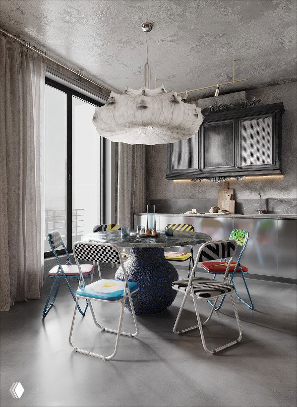Интерьер столовой: керамическая опора стола MOON в центре, над ней люстра Zeppelin, складные стулья с цветными принтами на фоне серой стены.