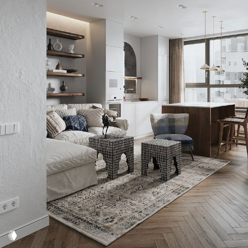 Угловой вид гостиной и кухни в одном пространстве: минималистичная планировка, текстуры дерева и этнические предметы в зонировании.