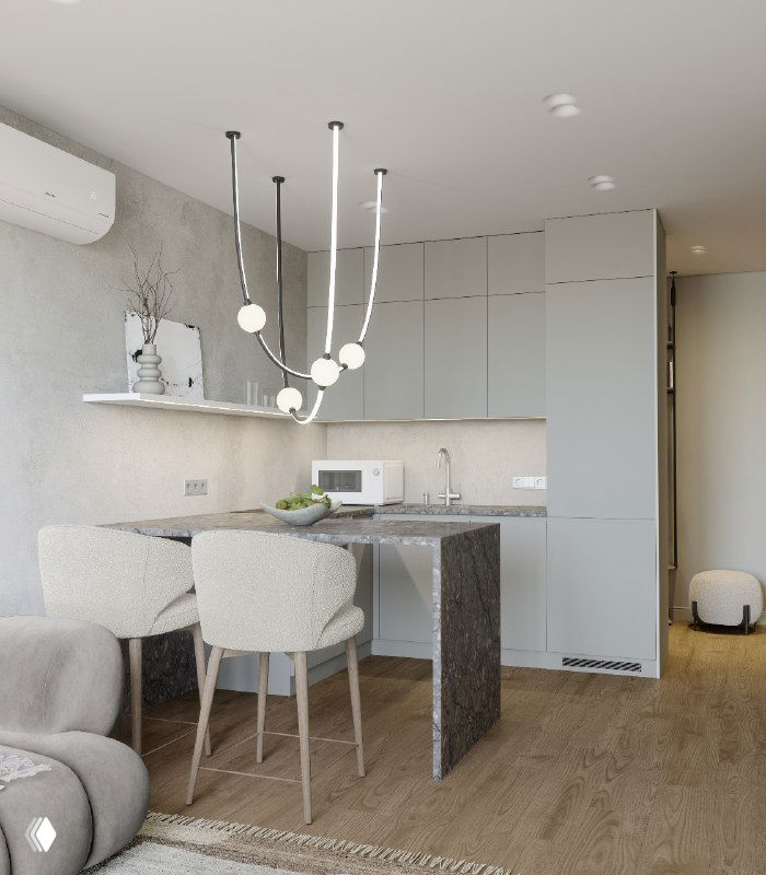 Светлый интерьер кухонно-гостиной: остров-стойка с мраморной столешницей, барные стулья, встроенные шкафы и деревянный пол.