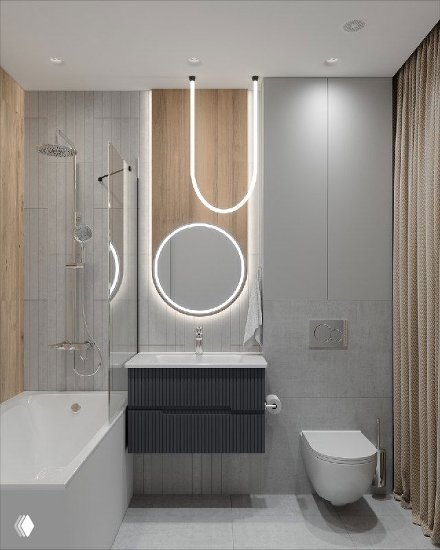 Ванная комната в светлых тонах с подвесной раковиной, круглым подсвеченным зеркалом и скрытой за плотной шторой зоной для техники и хранения вещей