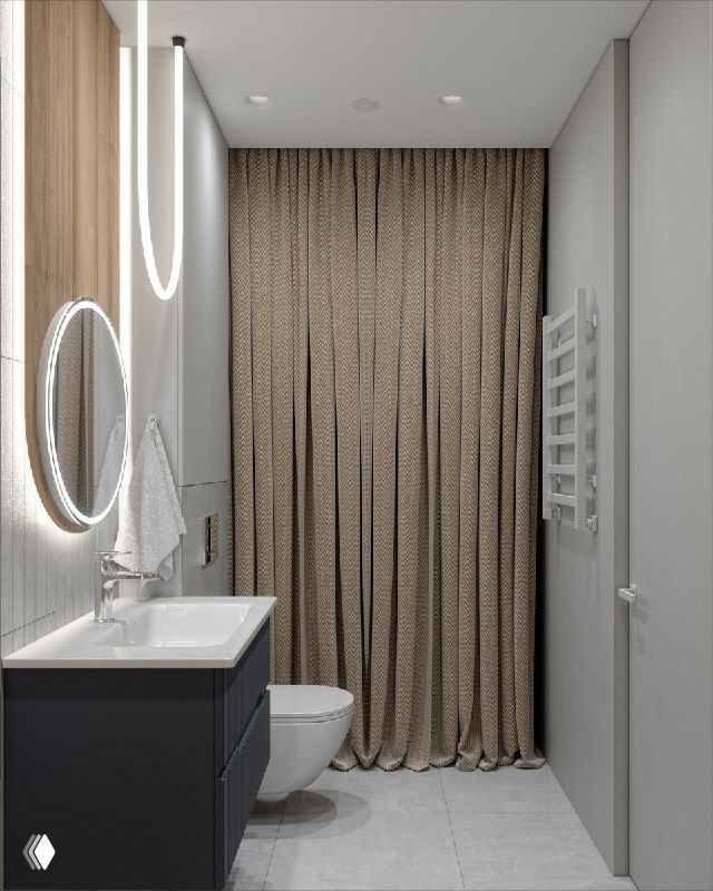 Интерьер ванной с закрытой шторами нишей, где спрятана стиральная машина; вид на туалет и подвесной шкаф в едином цветовом решении