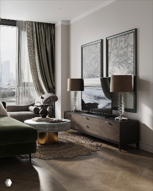 Гостиная: лаконичная тумба под телевизор, картины с ветвями яблонь как маскирующий фон, настольные лампы и часть зелёного дивана.