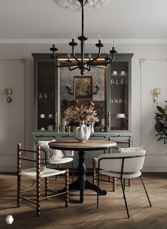 Столовая зона с круглым обеденным столом на резном подстолье, необычными стульями, кованой люстрой и классическим буфетом в нейтральной палитре