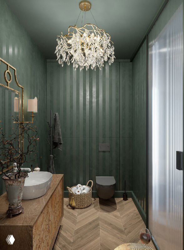 Широкий ракурс ванной комнаты с зелёными стенами в вертикальную рифлёную отделку, подвесной унитаз, корзина с полотенцами и элегантная люстра над центром.