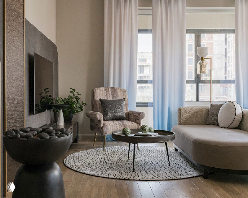 Гостиная с полукруглым диваном, креслом, круглым ковром и панорамным окном; акцент на натуральных текстурах и приглушённых тонах в реализованном интерьере.
