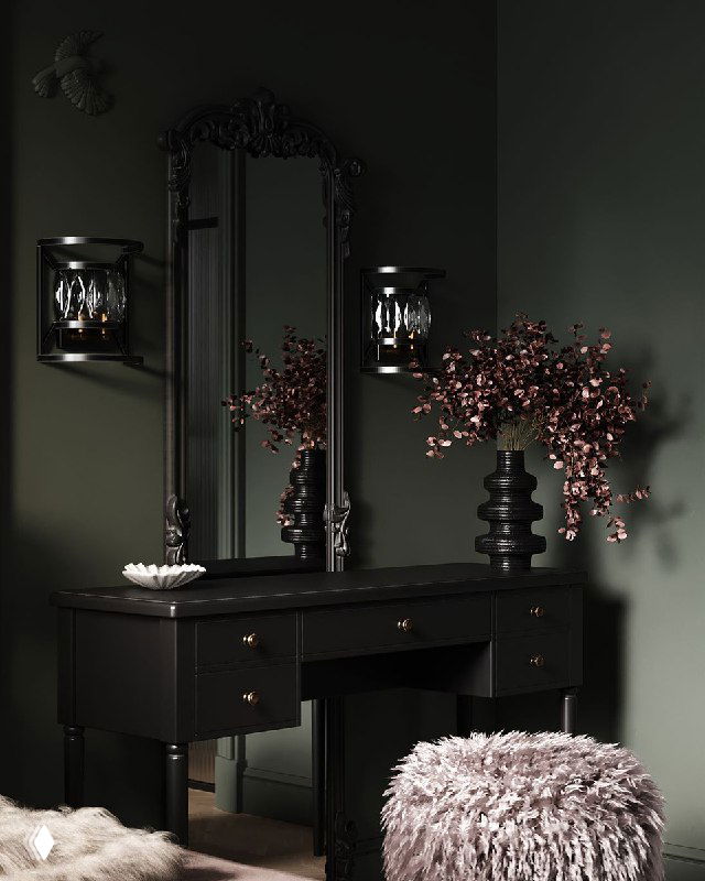 Темное готическое зеркало с резной рамой над консолью, рядом декоративные вазы и мягкая пушистая табуретка в уютном углу.