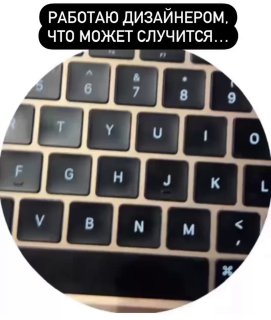 Крупный план клавиатуры ноутбука в круглой рамке; видны отдельные клавиши, подсветка и фрагмент наклейки с текстом сверху.