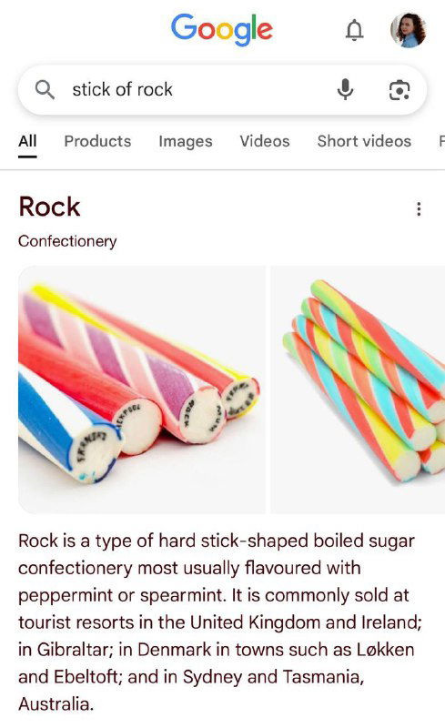 Скриншот поиска Google по запросу 'stick of rock': показаны изображения длинных цилиндрических карамельных палочек и краткая карточка с определением сладости.