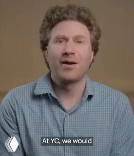 Close-up portrait of a man speaking on camera in a checked shirt against a neutral background; video preview for Placy AI post.