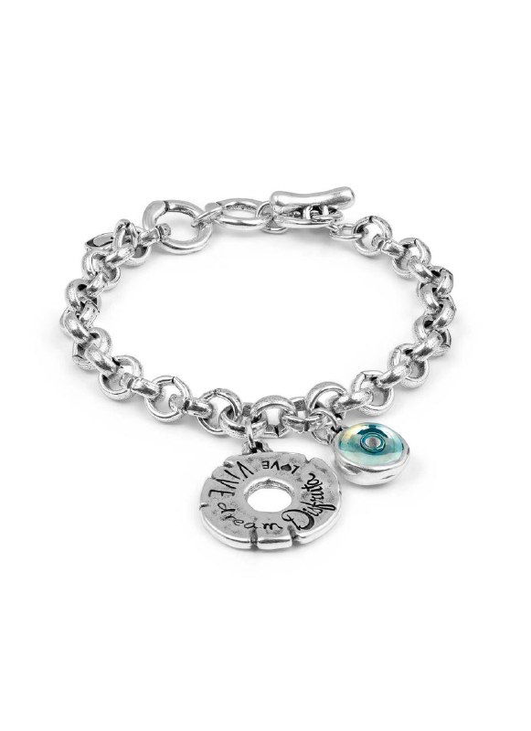 Браслет Ciclon из серии Disfrutar: металлическая цепочка с медальоном и маленькой бирюзовой подвеской, товар на белом фоне.