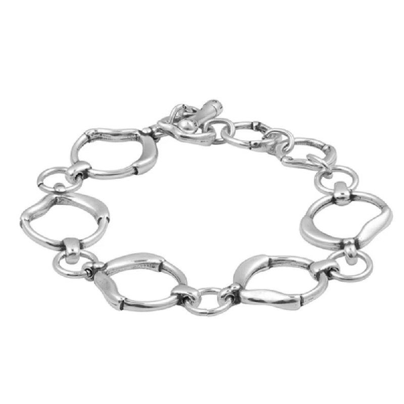 Элегантный браслет Ciclon из крупных звеньев овальной формы, фотография на белом фоне, акцент на форме звеньев и застёжке.