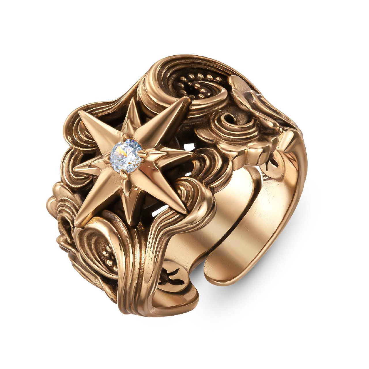 Золотистое декоративное кольцо с объёмными волнистыми элементами и центральной восьмиконечной звездой с прозрачной вставкой, товарный макроракурс.
