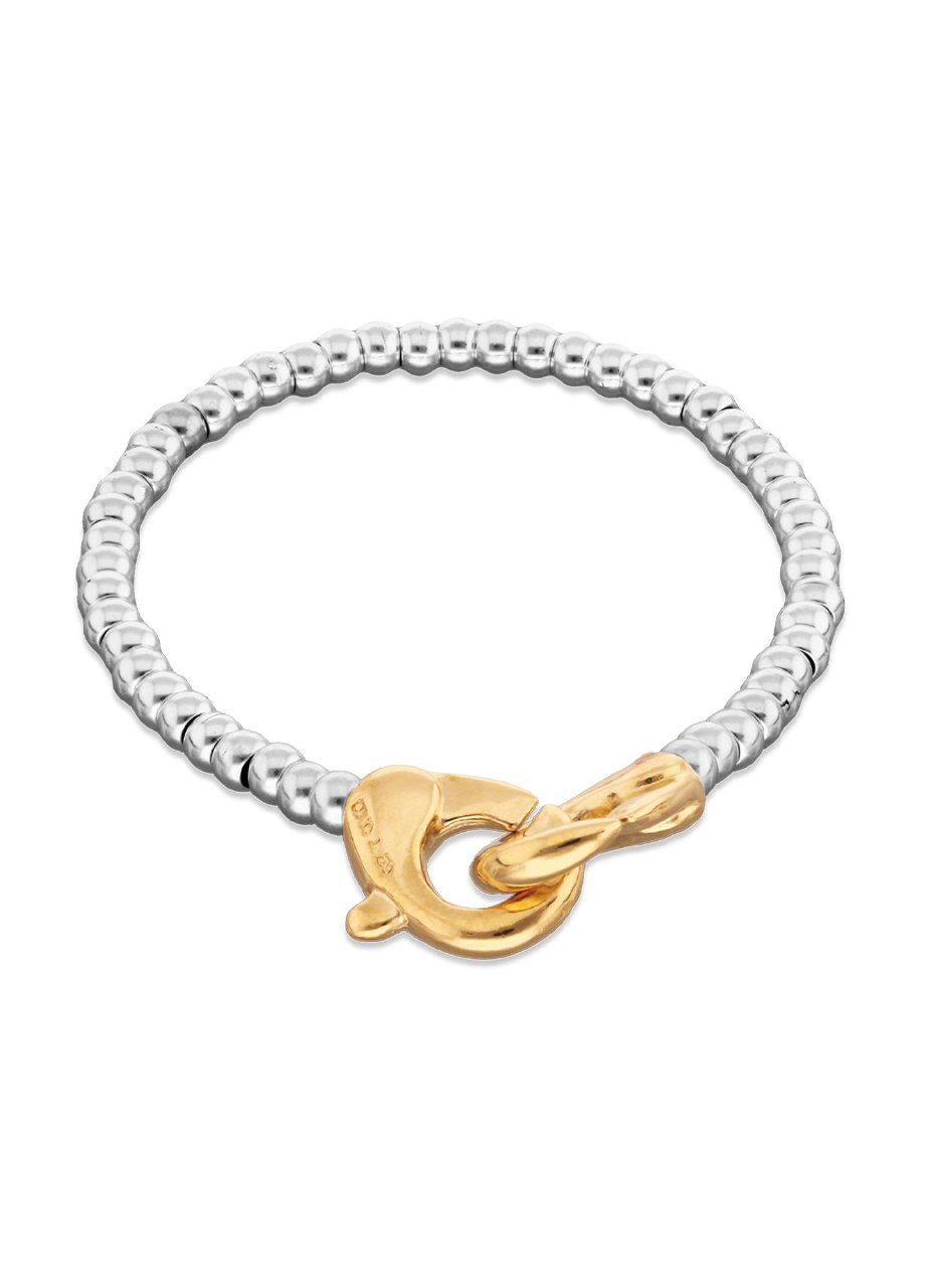 Крупный план браслета Ser Inseparable: серебристые бусины и позолоченный соединительный карабин на нейтральном фоне, детальная фактура металла.