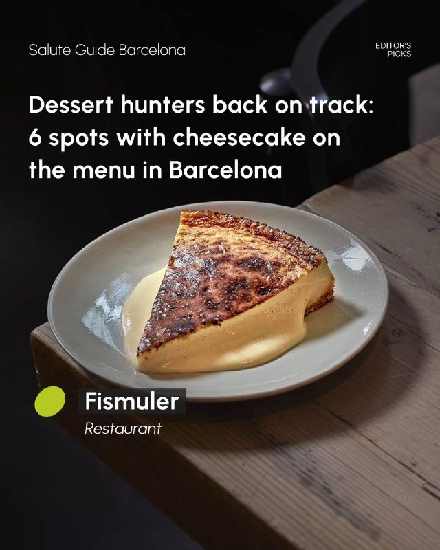 Triangular slice of cheesecake with a caramelised top on a plate, wooden tabletop and soft natural light indicating a restaurant setting.